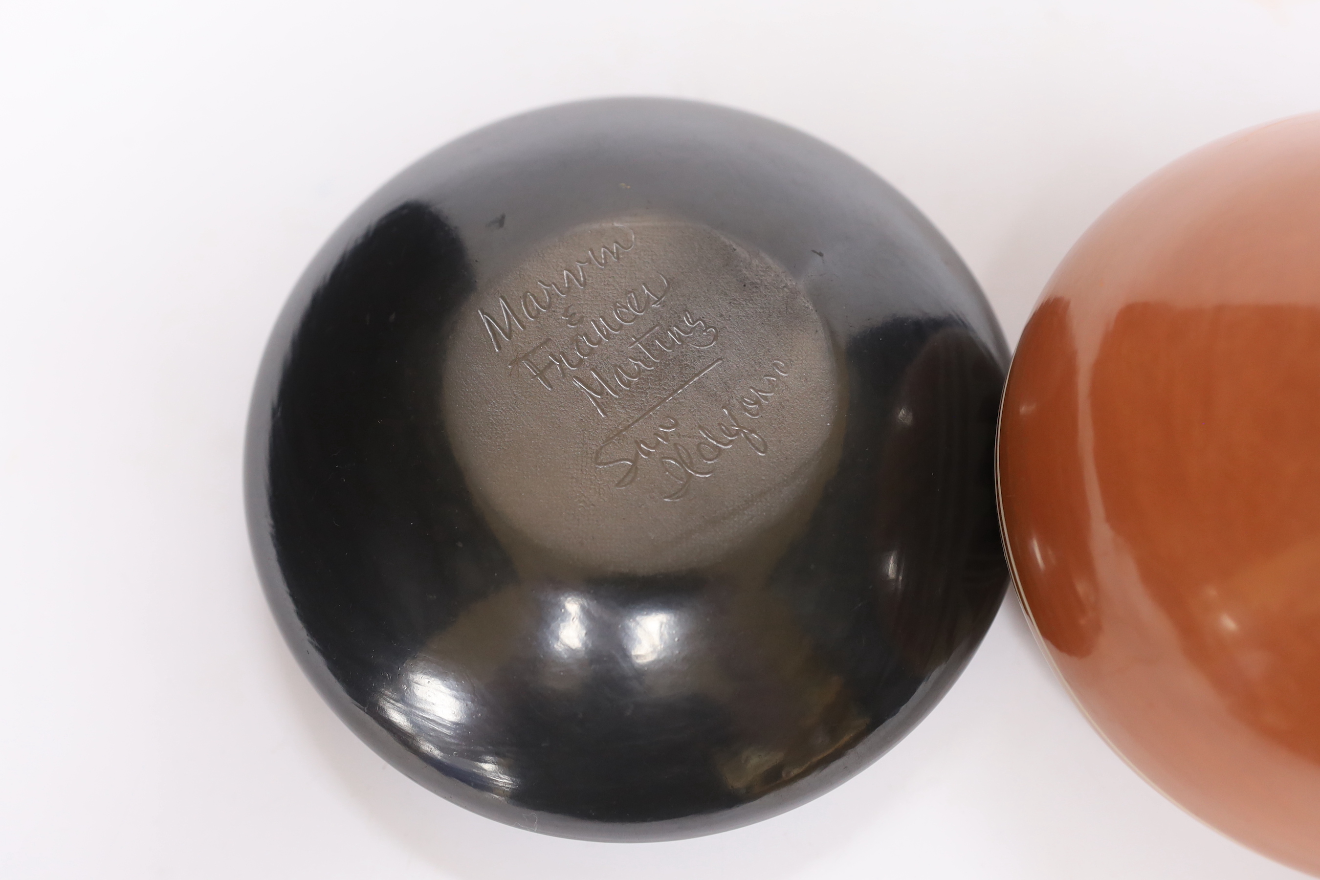 Two North American studio pottery vessels; a Marvin and Frances Martinez pottery bowl and a Kathy Gutierrez burnished bowl, tallest 10cm